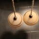 Lot de deux suspensions Art Déco en verre rose et doré