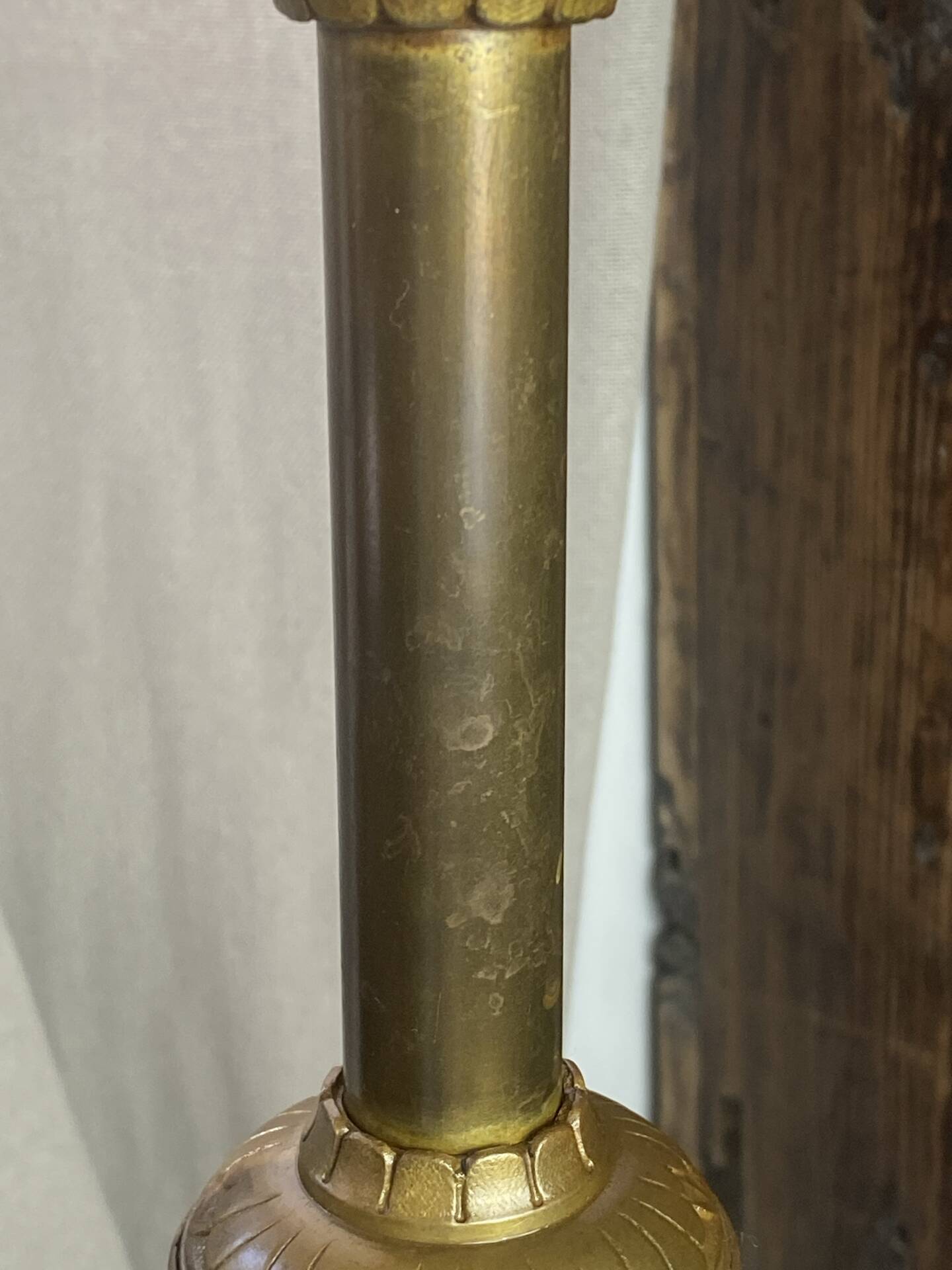 Pair of candlesticks in bronze and brass