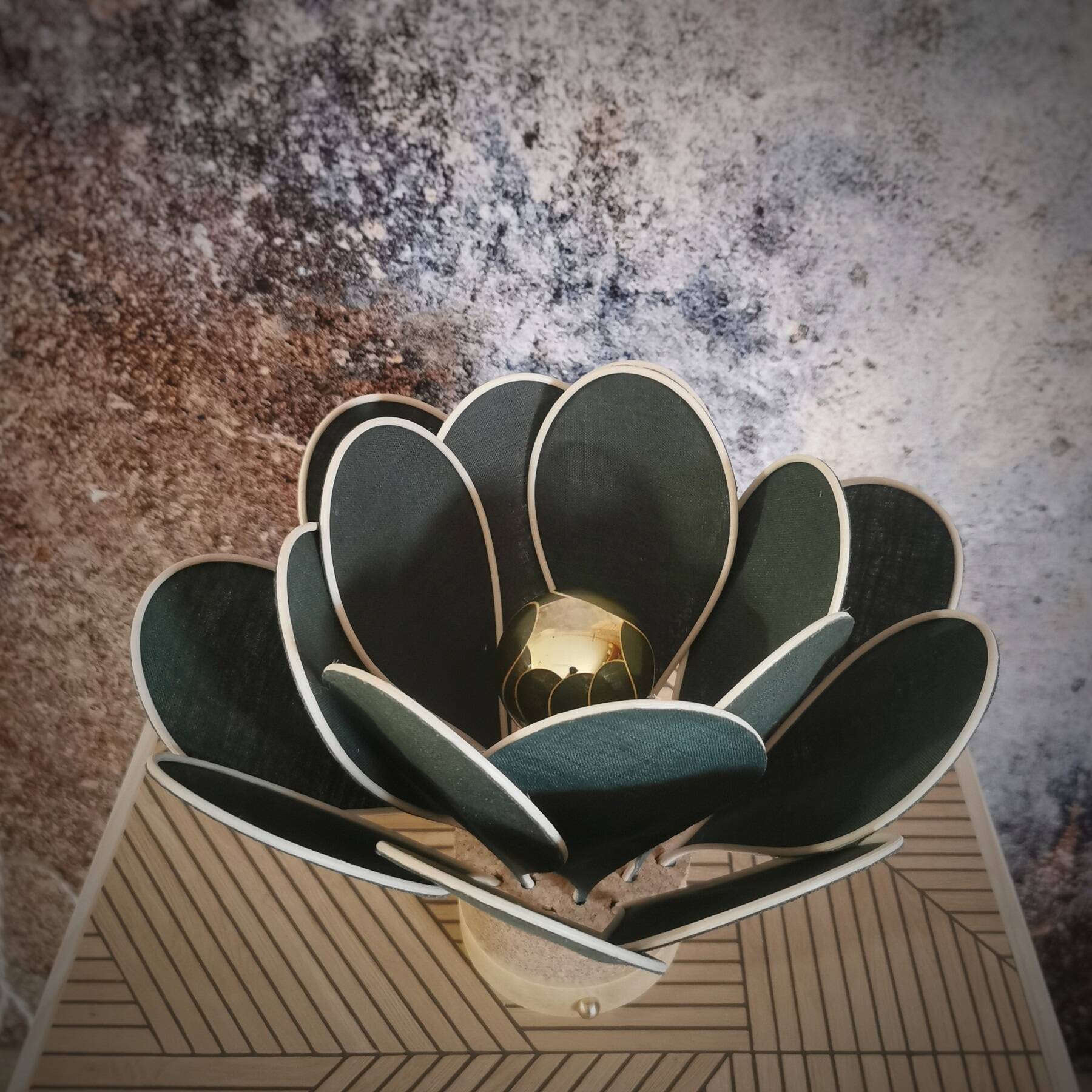 Flower table lamp made of rattan and fir green linen petals