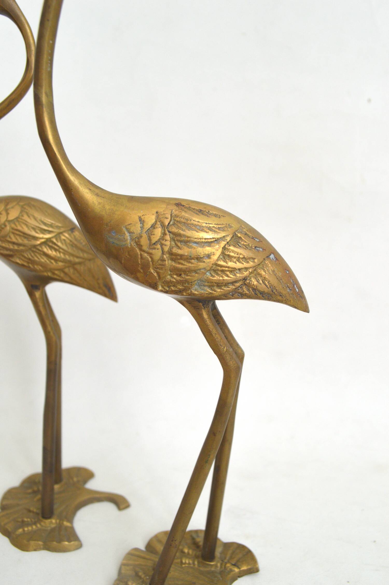 Couple of brass birds