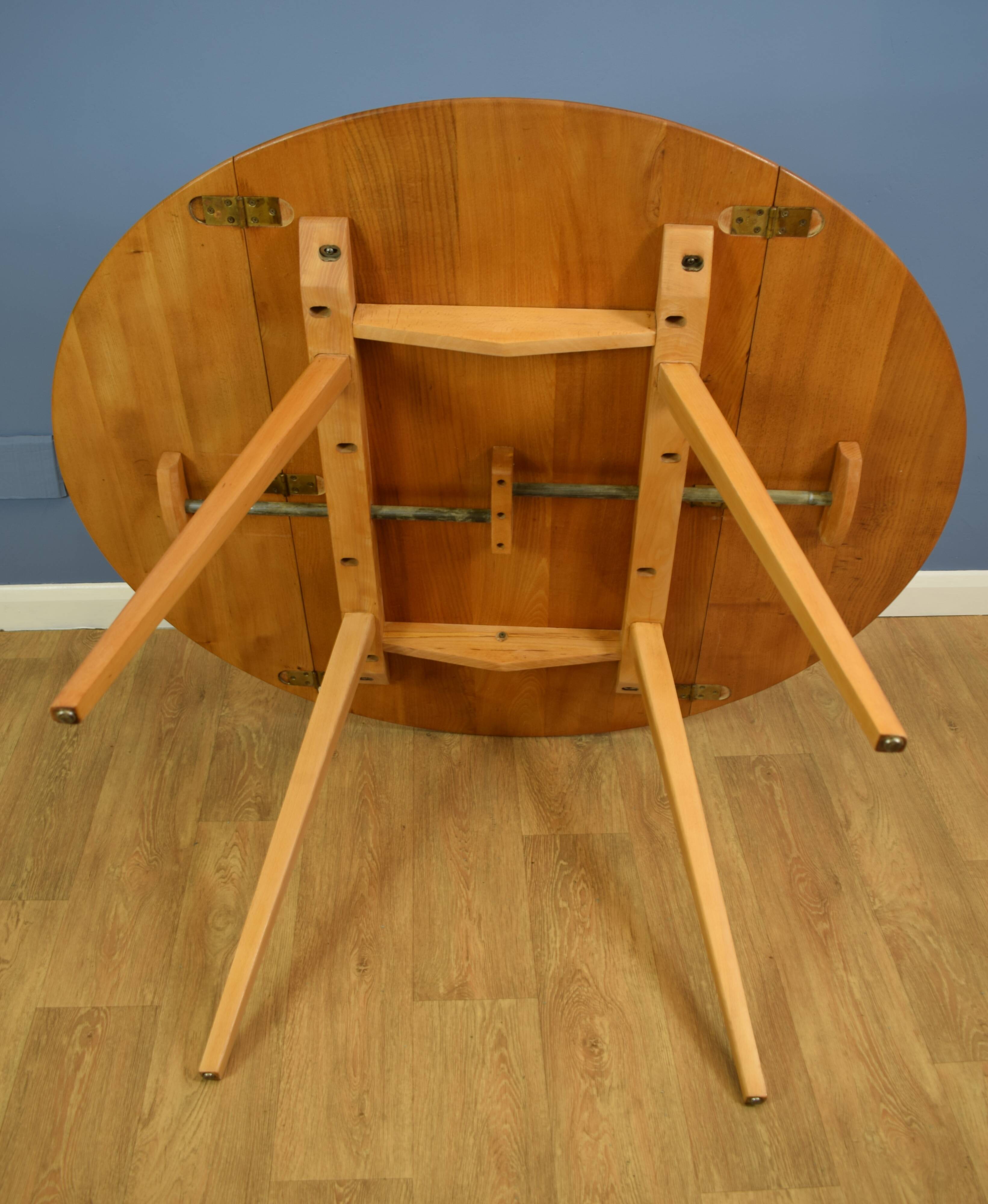 Mid Century Retro Elm and Beech Circular Dining Table by Ercol  1970s