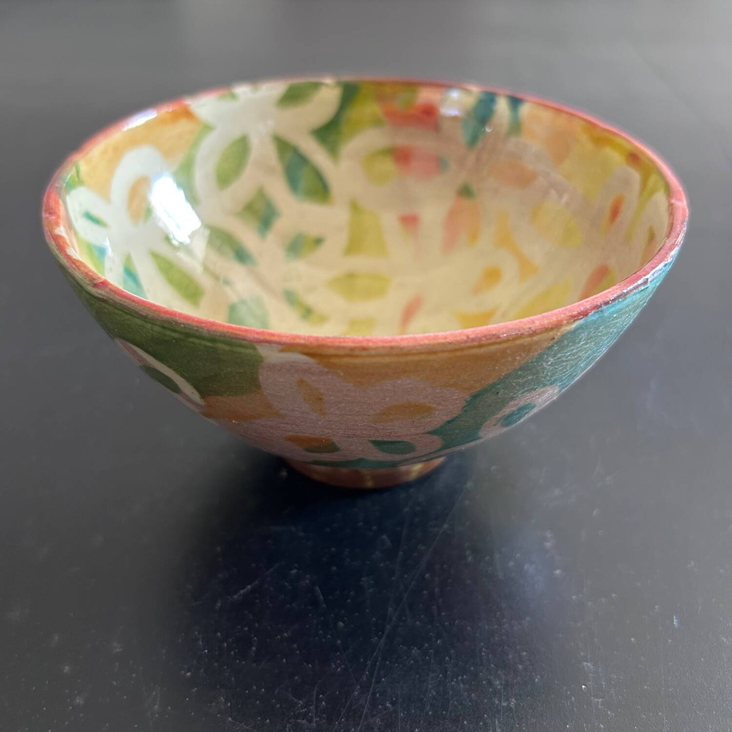 Signed bowl painted with stencil