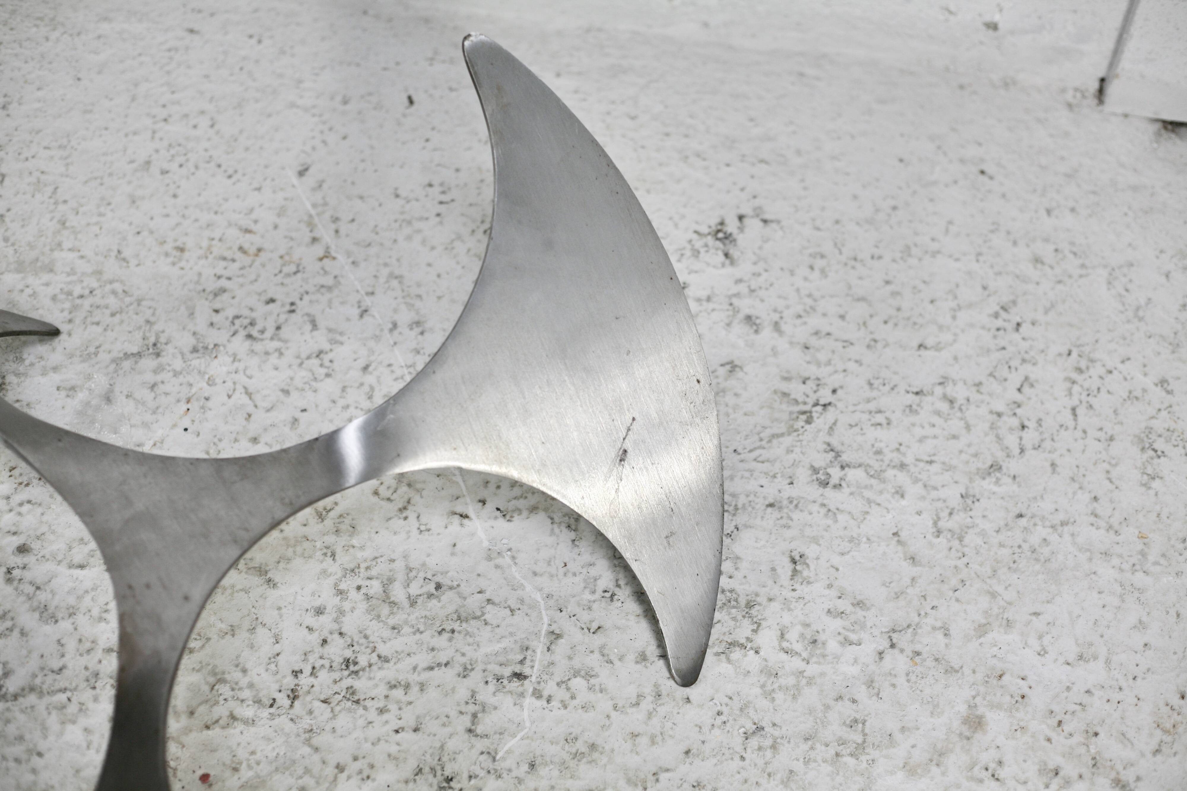 "space age" coffee table. Steel legs, glass slab. Circa 1970