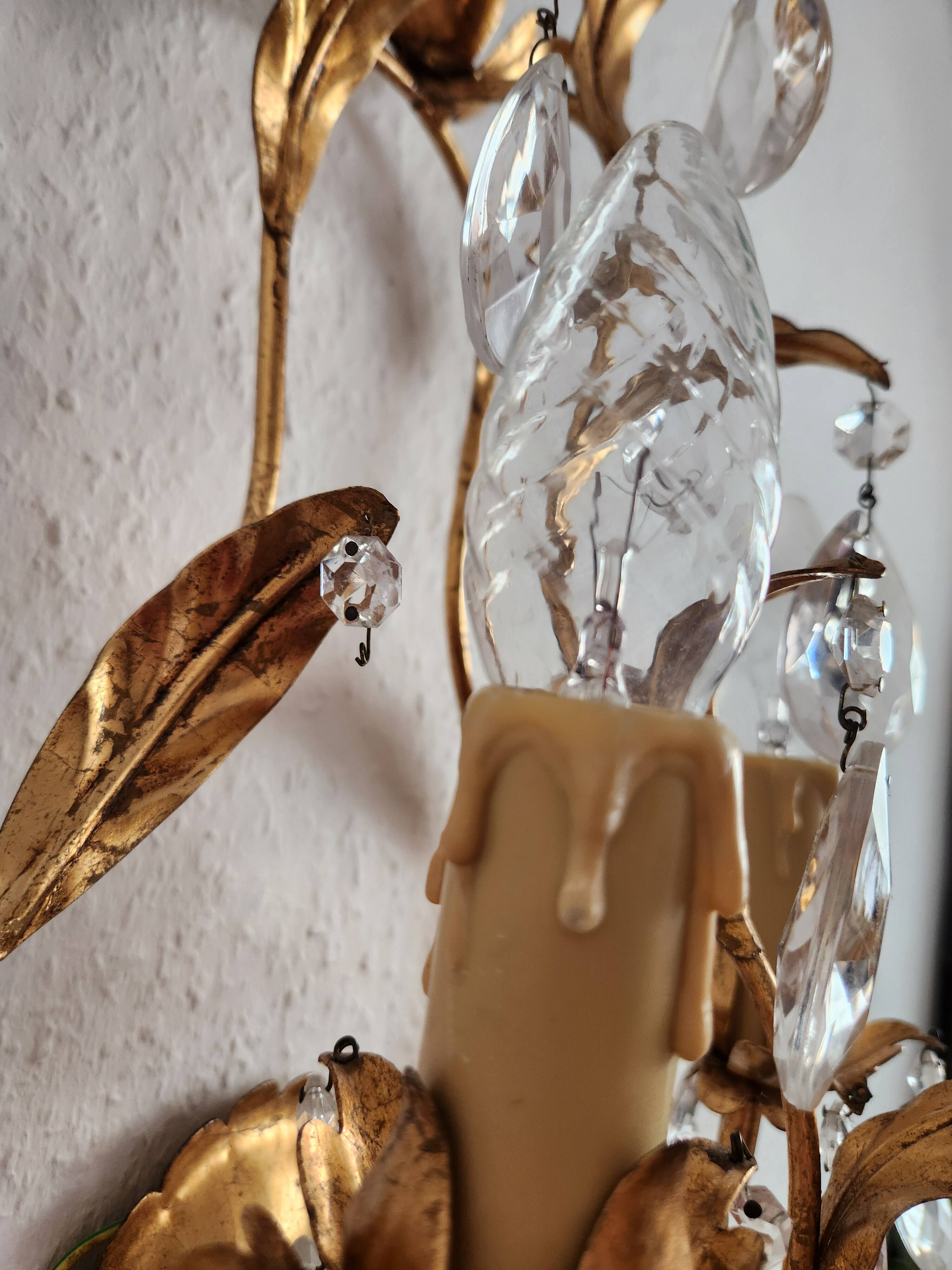 Hand-forged wall lamp gilded with gold leaf and crystals, Italy