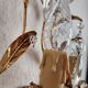 Hand-forged wall lamp gilded with gold leaf and crystals, Italy