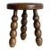 Small three-legged stool made of turned wood.