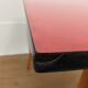 Bureau et chaise Baumann Pégase rouges, pieds compas