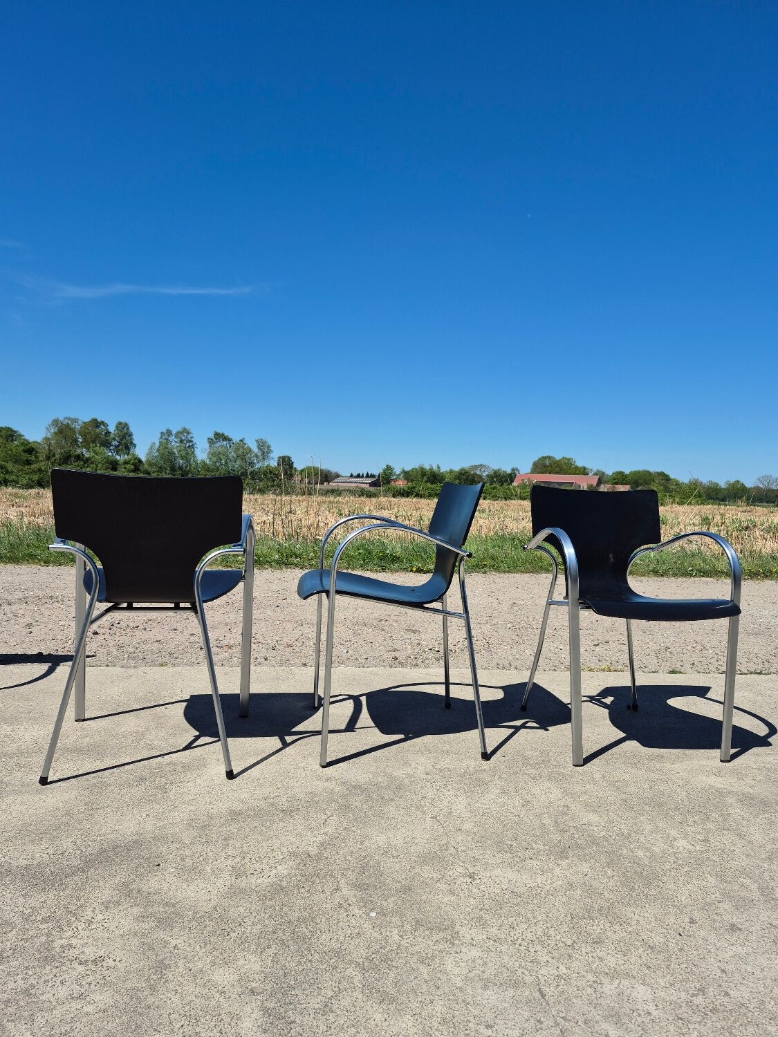 Set 4 postmodern black chrome stackable chair Jim for Kens 1990s