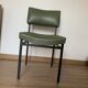 green and metal skai chair