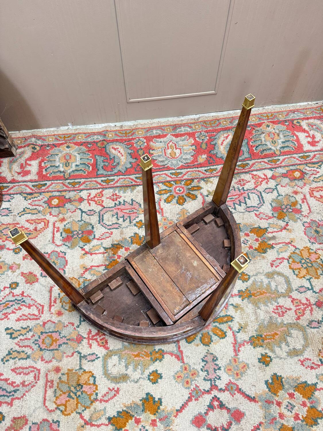 Half-moon game table in marquetry from the Louis XVI period, 18th century.