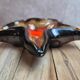 Vintage starfish bowl in ceramic Vallauris red and black lava style.