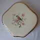 Trivet and bottle holder Salin, 1950s. Bird on branch.