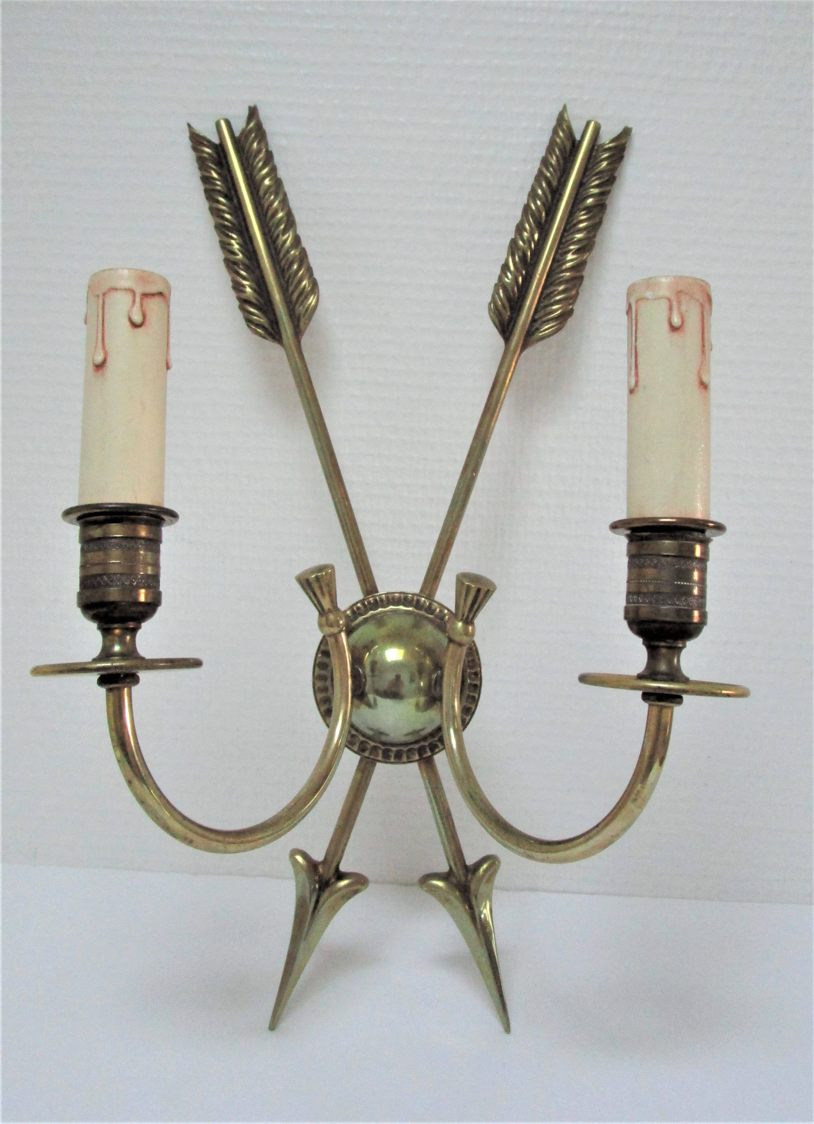 Pair of bronze crossed arrow wall lights Lucien Gau