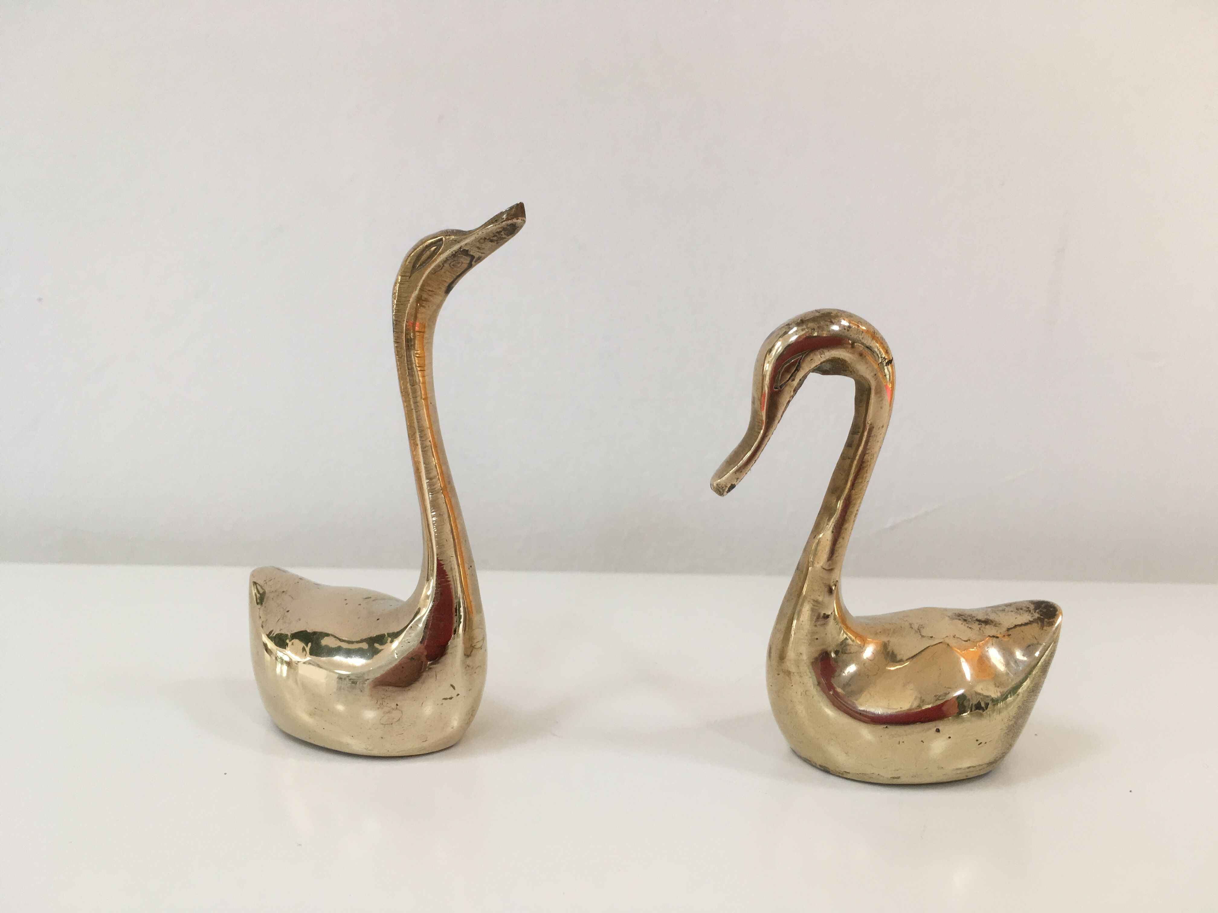 Pair of vintage brass swans