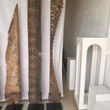 Rectangular Indonesian construction element with blue and yellow plant in carved wood