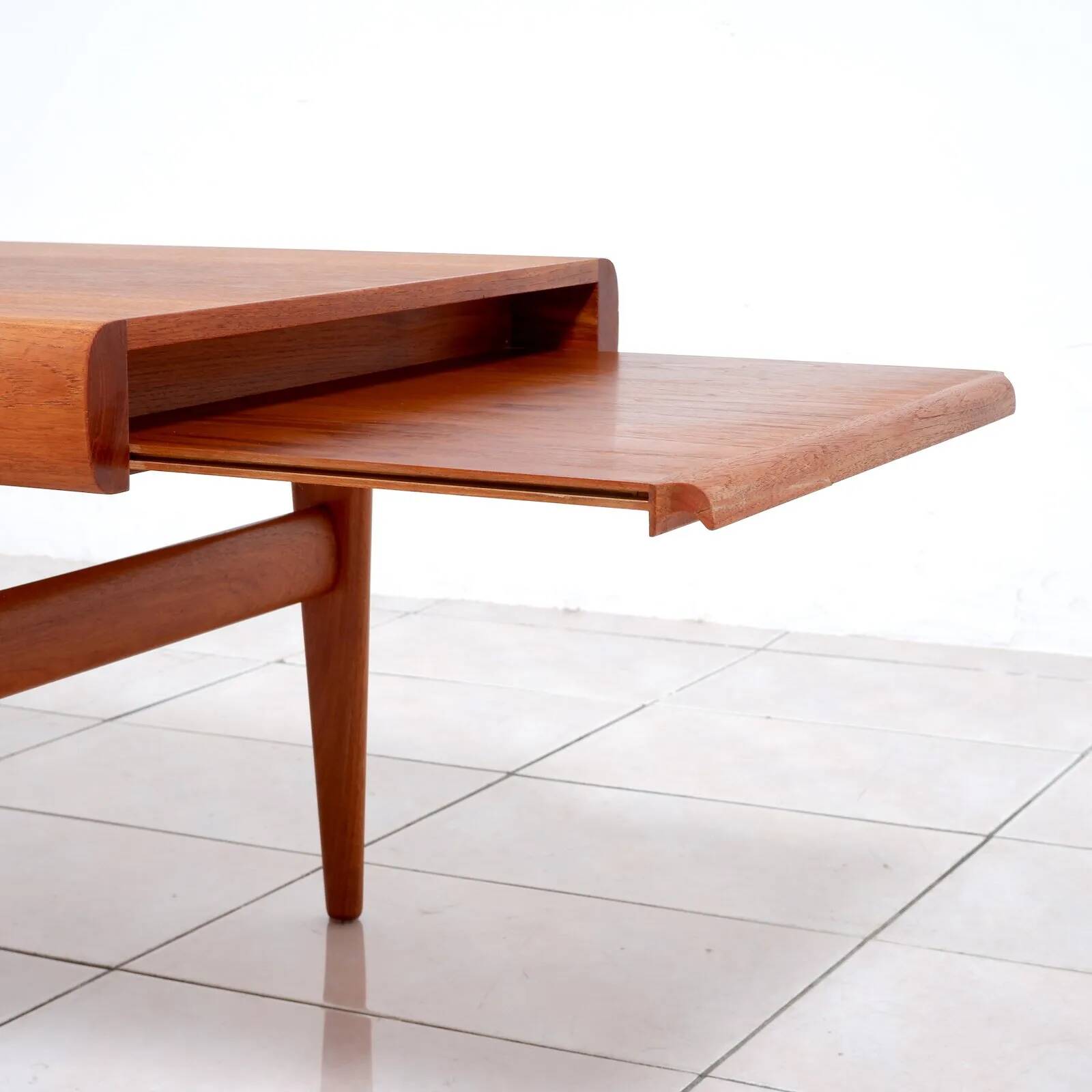 Large teak coffee table by Johannes Andersen for Uldum Møbelfabrik