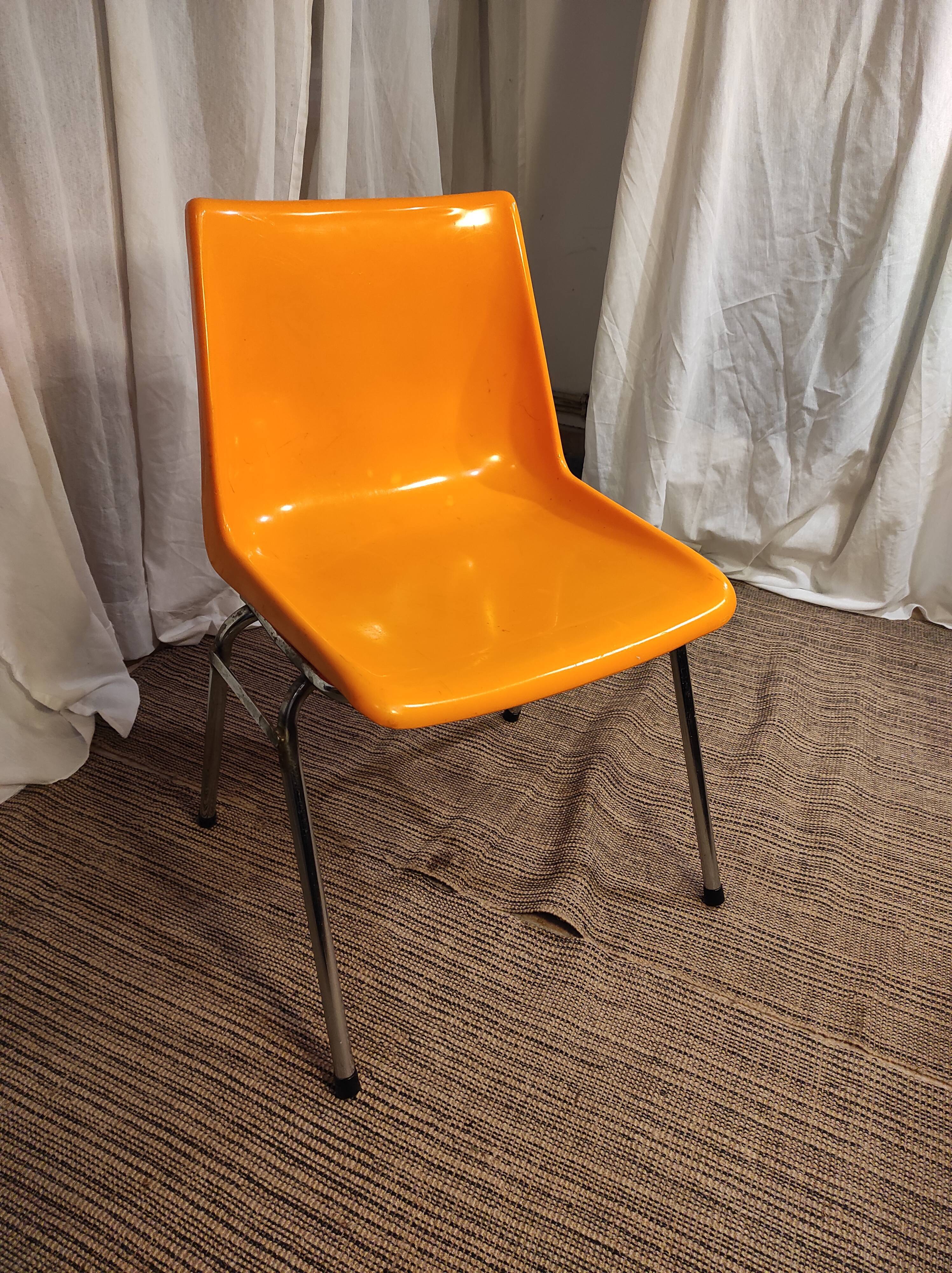 Orange plastic chair 1970