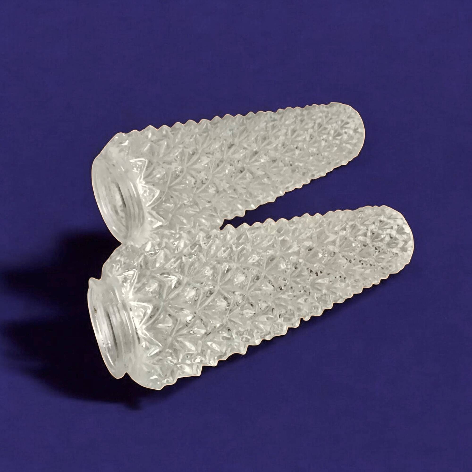 Pair of vintage wall sconces in molded glass and gilded brass