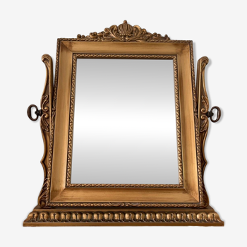 Swivel dressing table mirror to stand in gilded wood