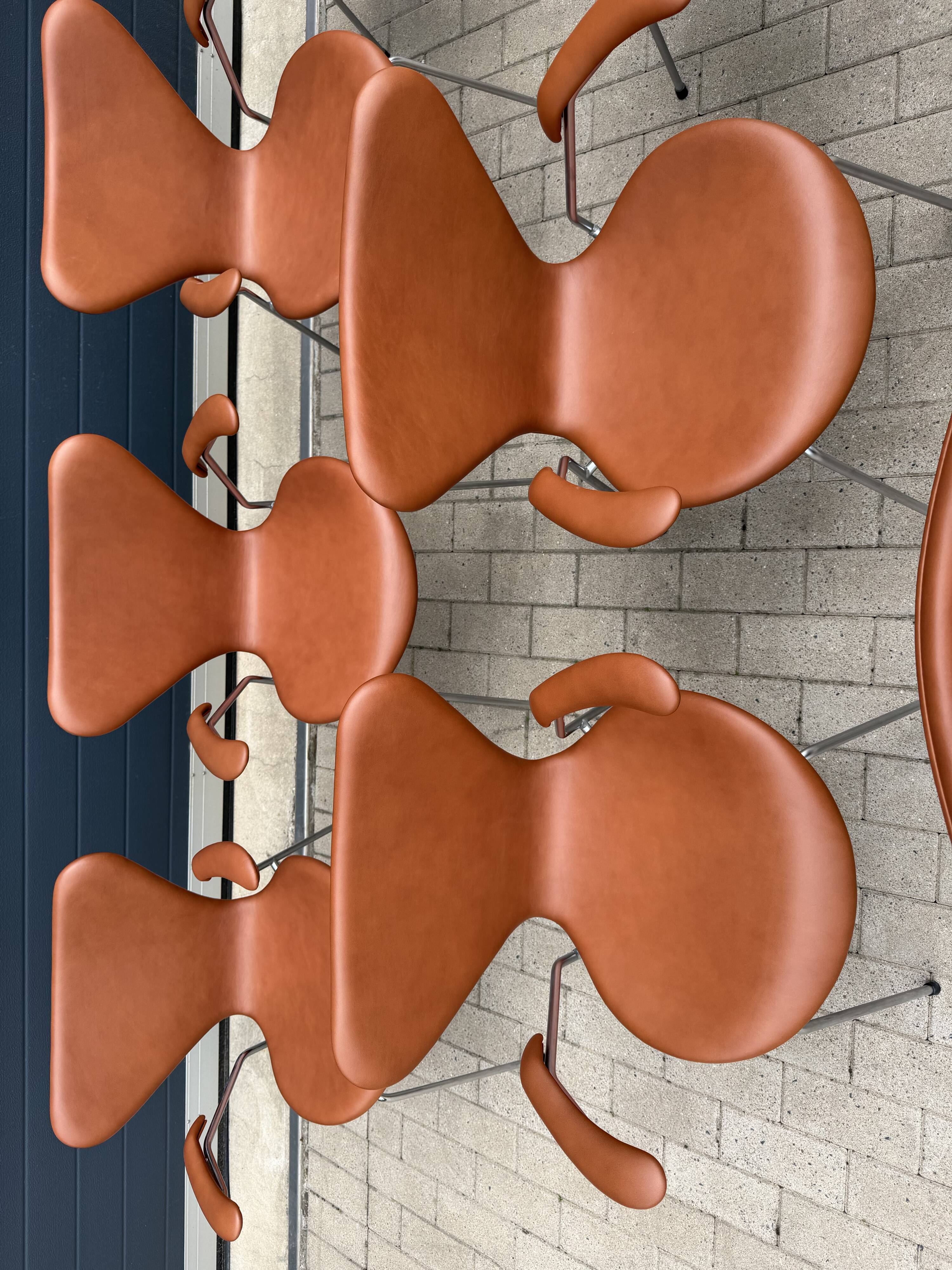 10x armchairs with arms, series 7 Butterfly Fritz Hansen by Arne Jacobsen in Cognac leather, in perfect condition.