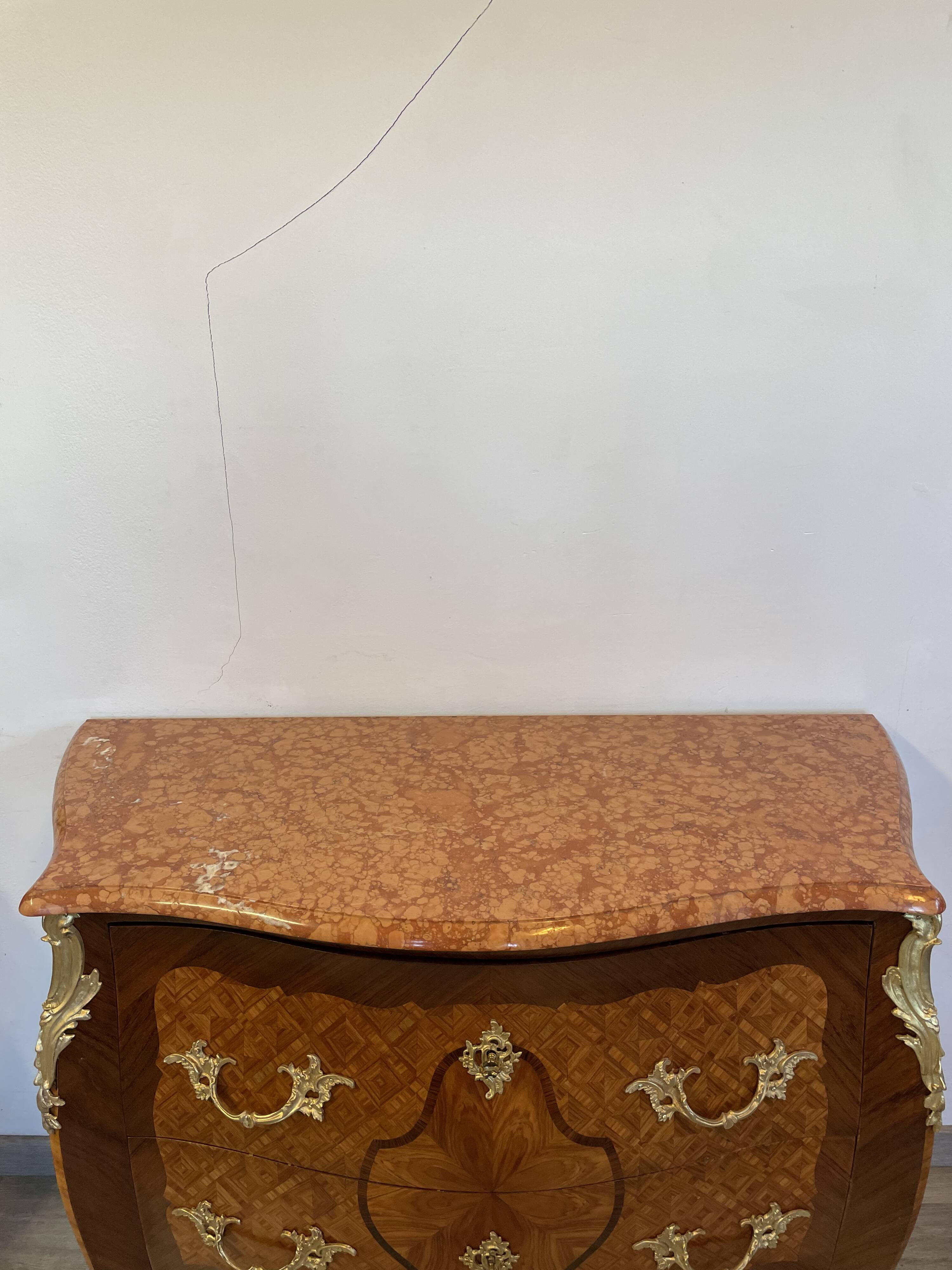 Louis XV chest of drawers in rosewood