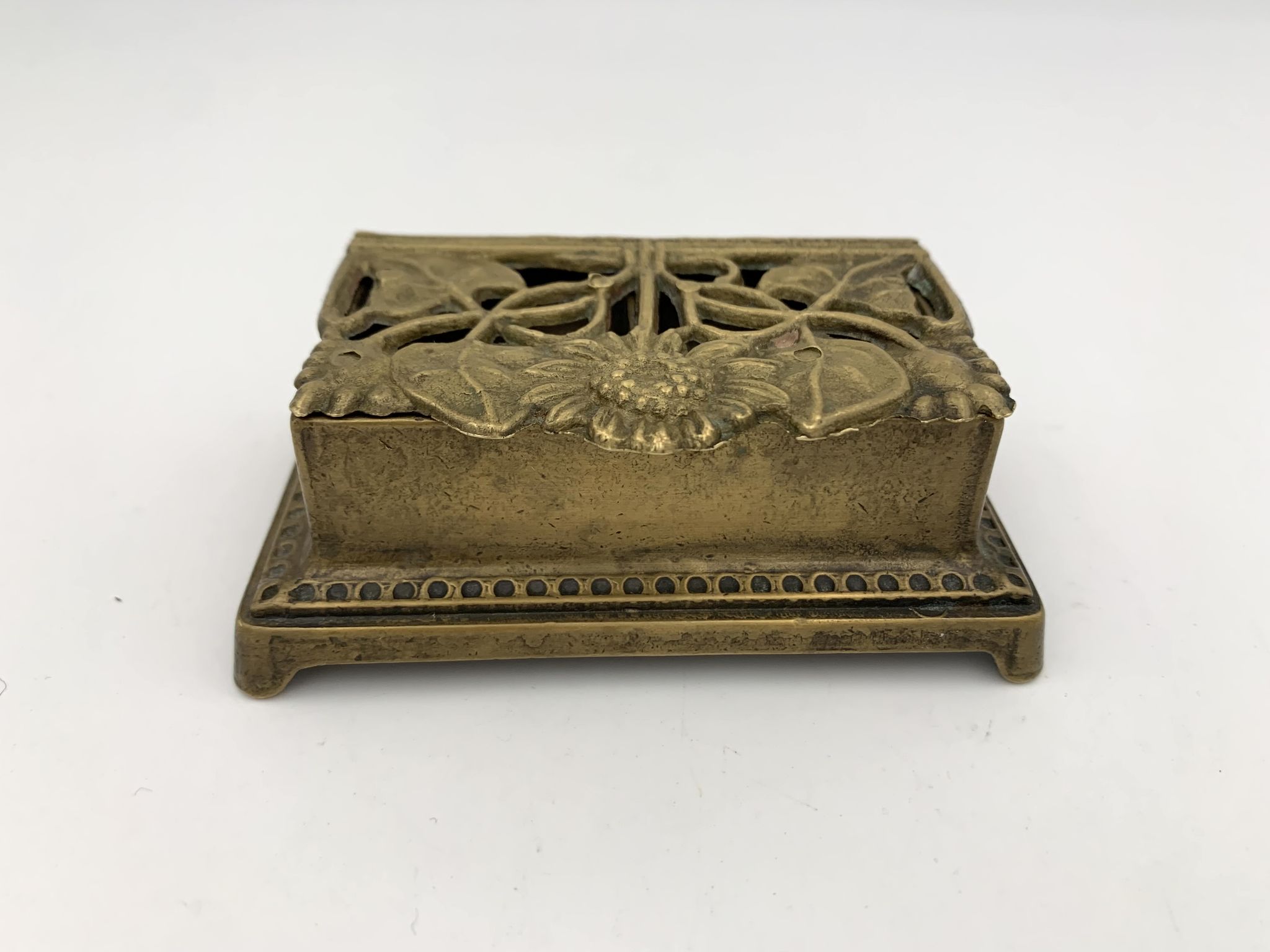 Old brass stamp box, floral decoration - twentieth century
