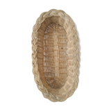 Oval wicker basket with braided edges