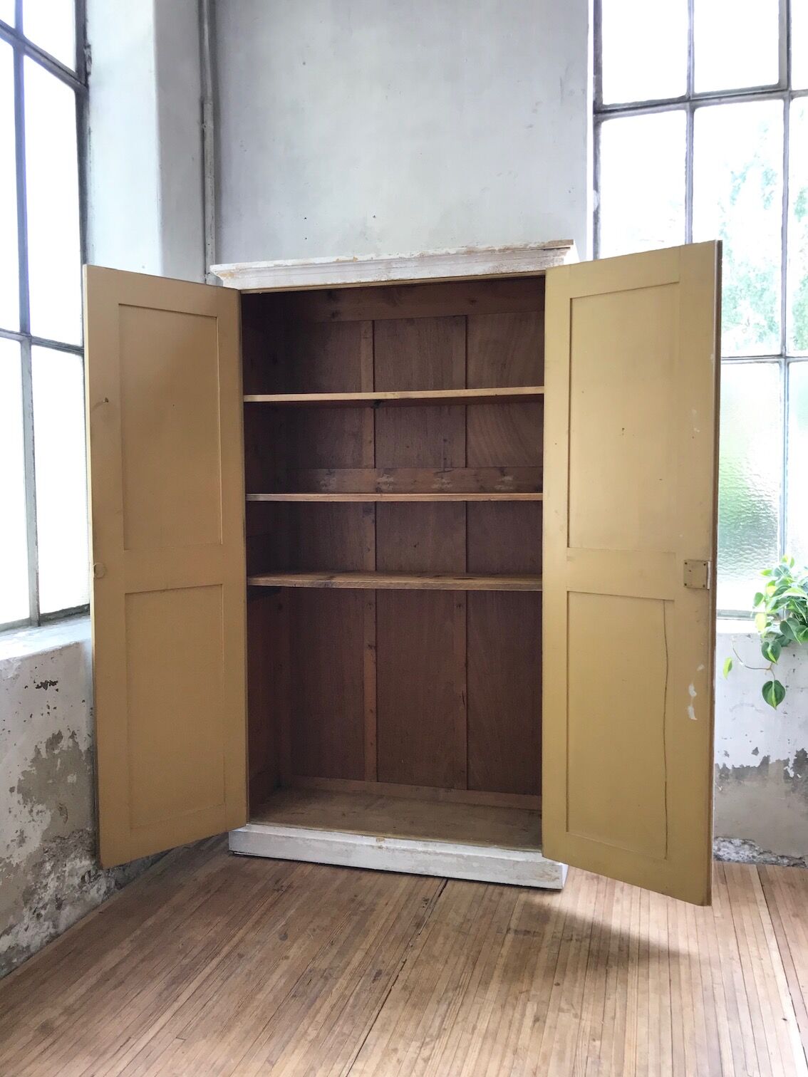 Antique wardrobe in patinated pine