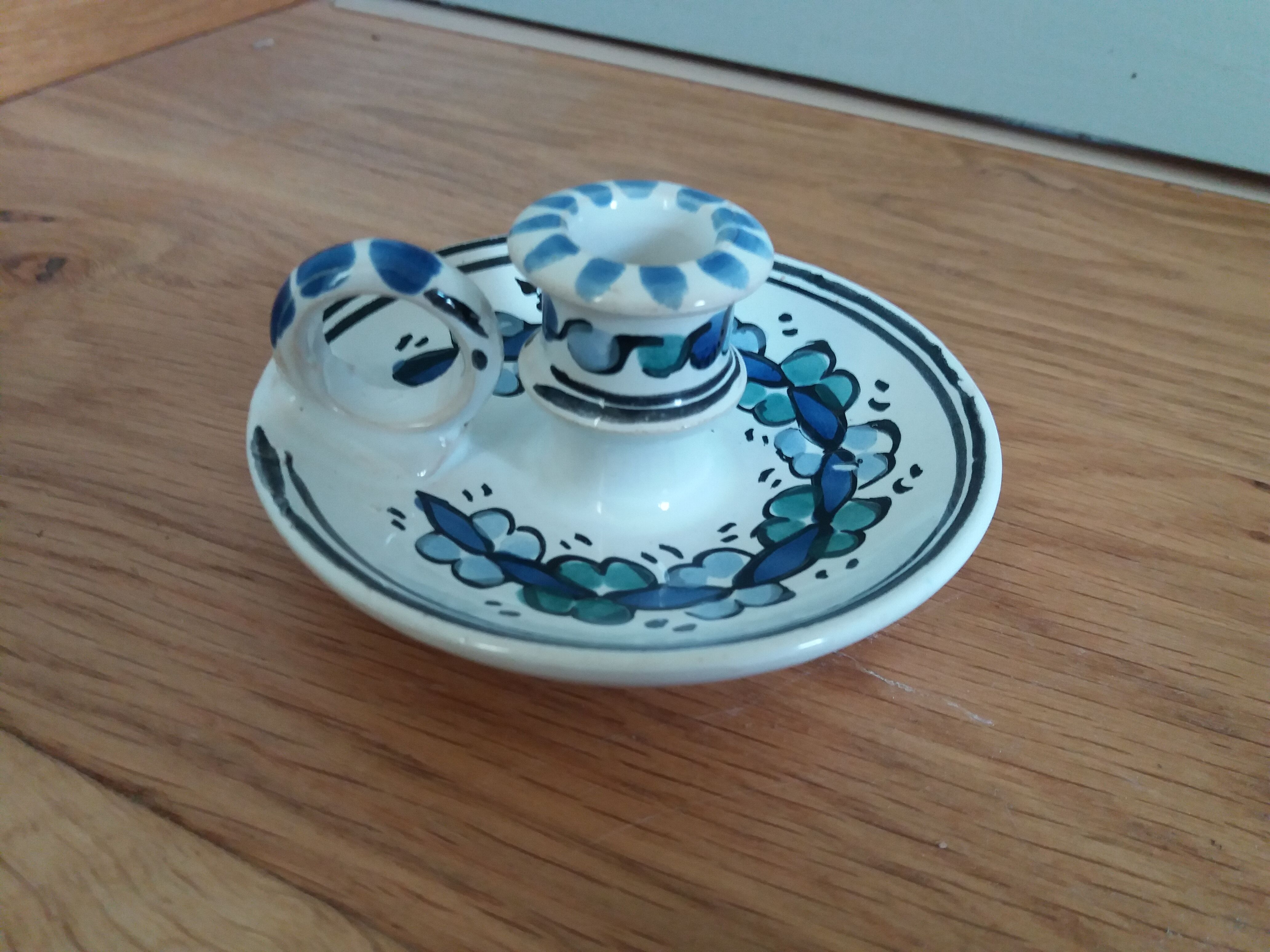 Cellar rat candle holder