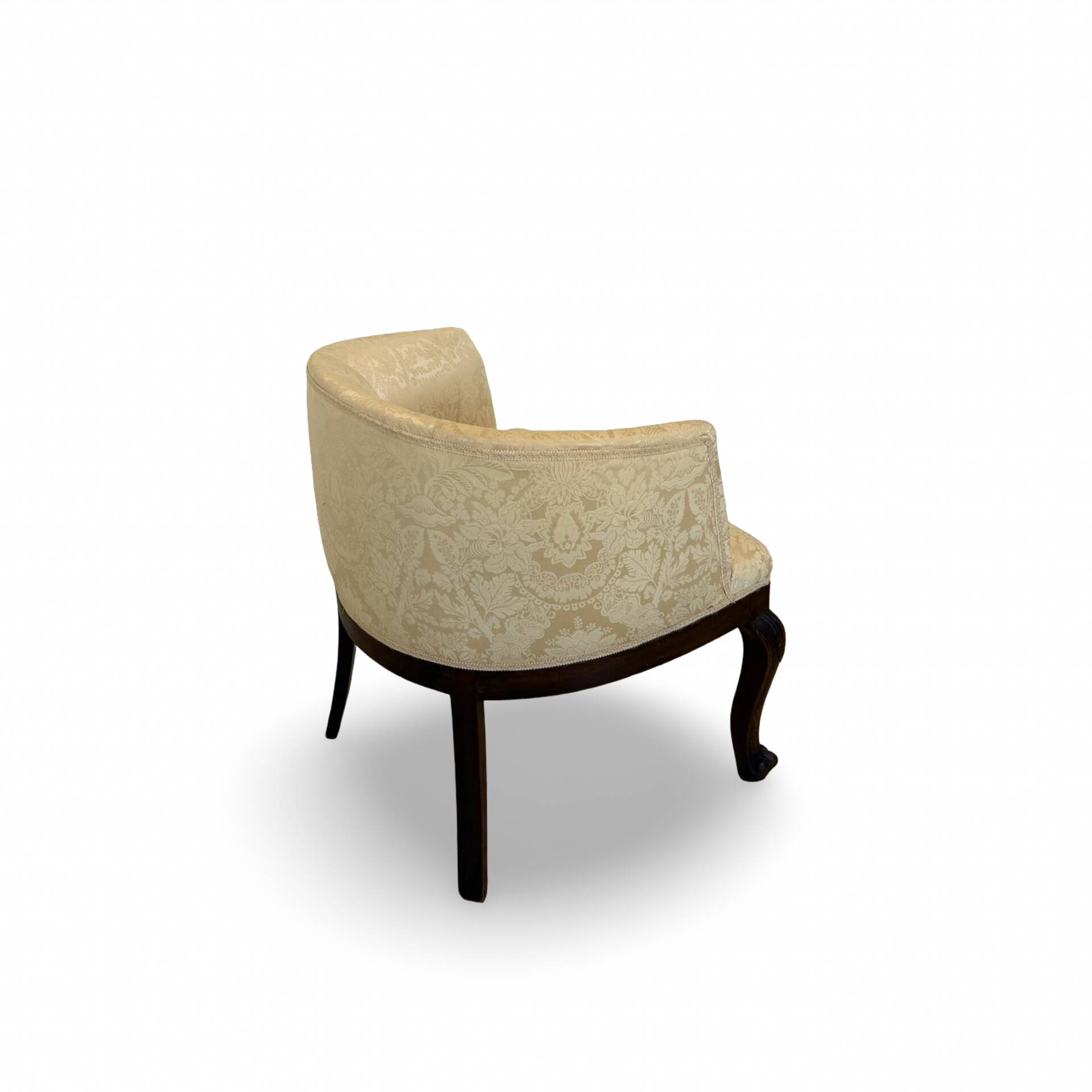 An antique Italian bar chair and a matching tufted vanity stool.