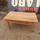 Wooden coffee table with a drawer