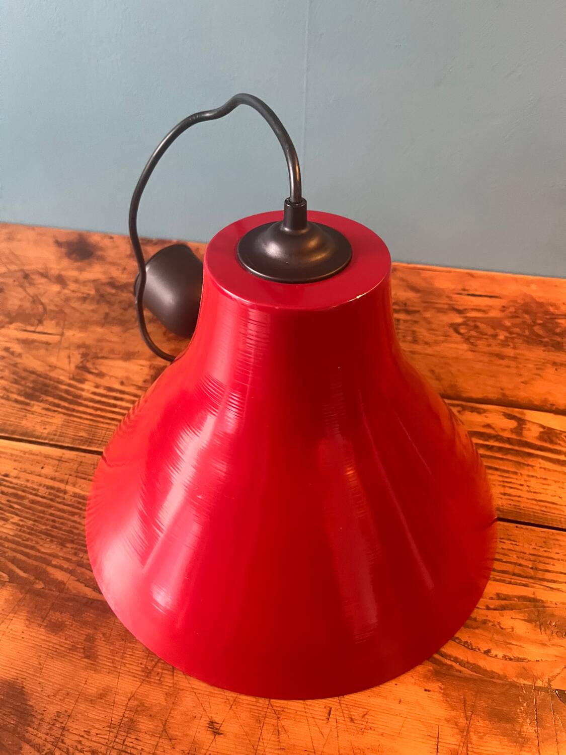Red metal bell pendant from the 80s