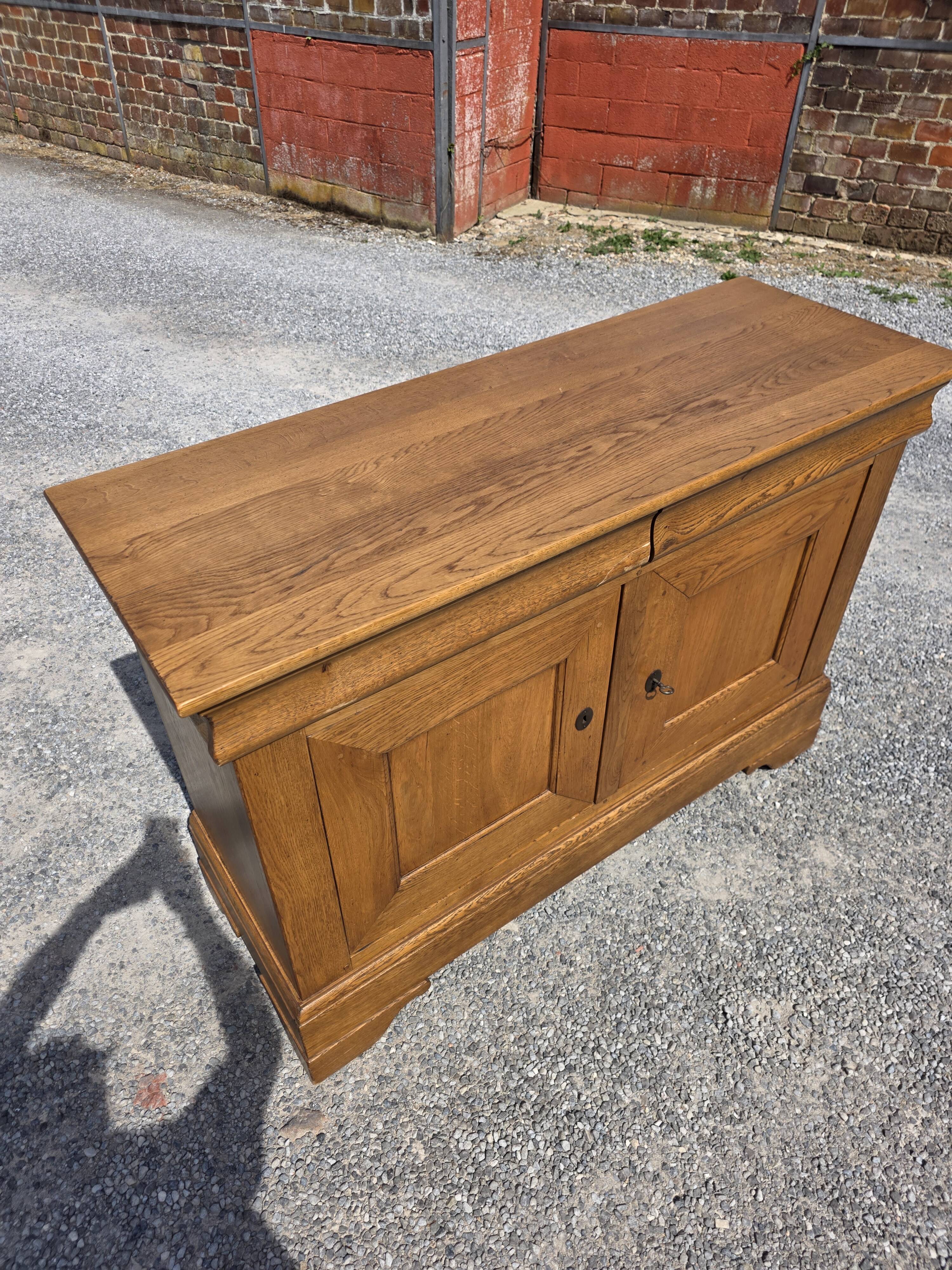 Louis Philippe buffet in solid oak.