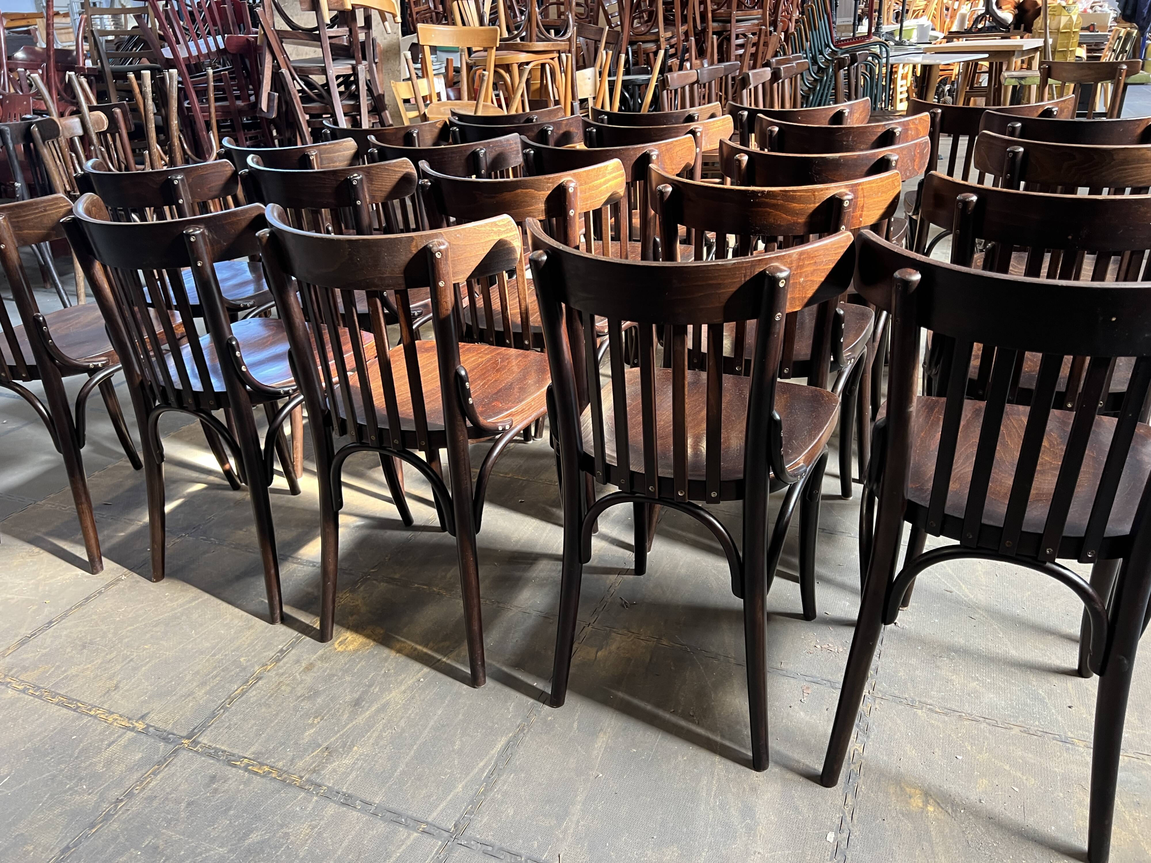 Set of 24 restored bistro chairs.