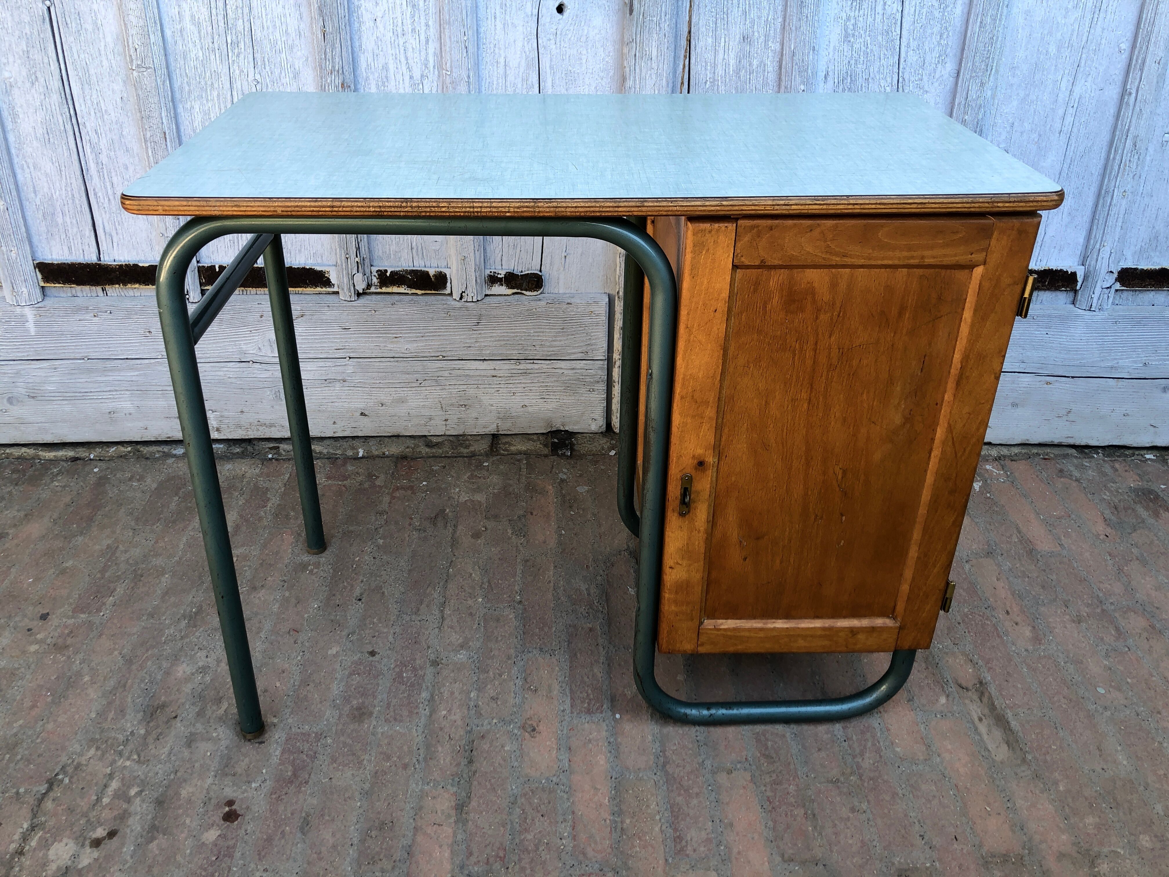 Office 1950 tubular metal and mint green formica