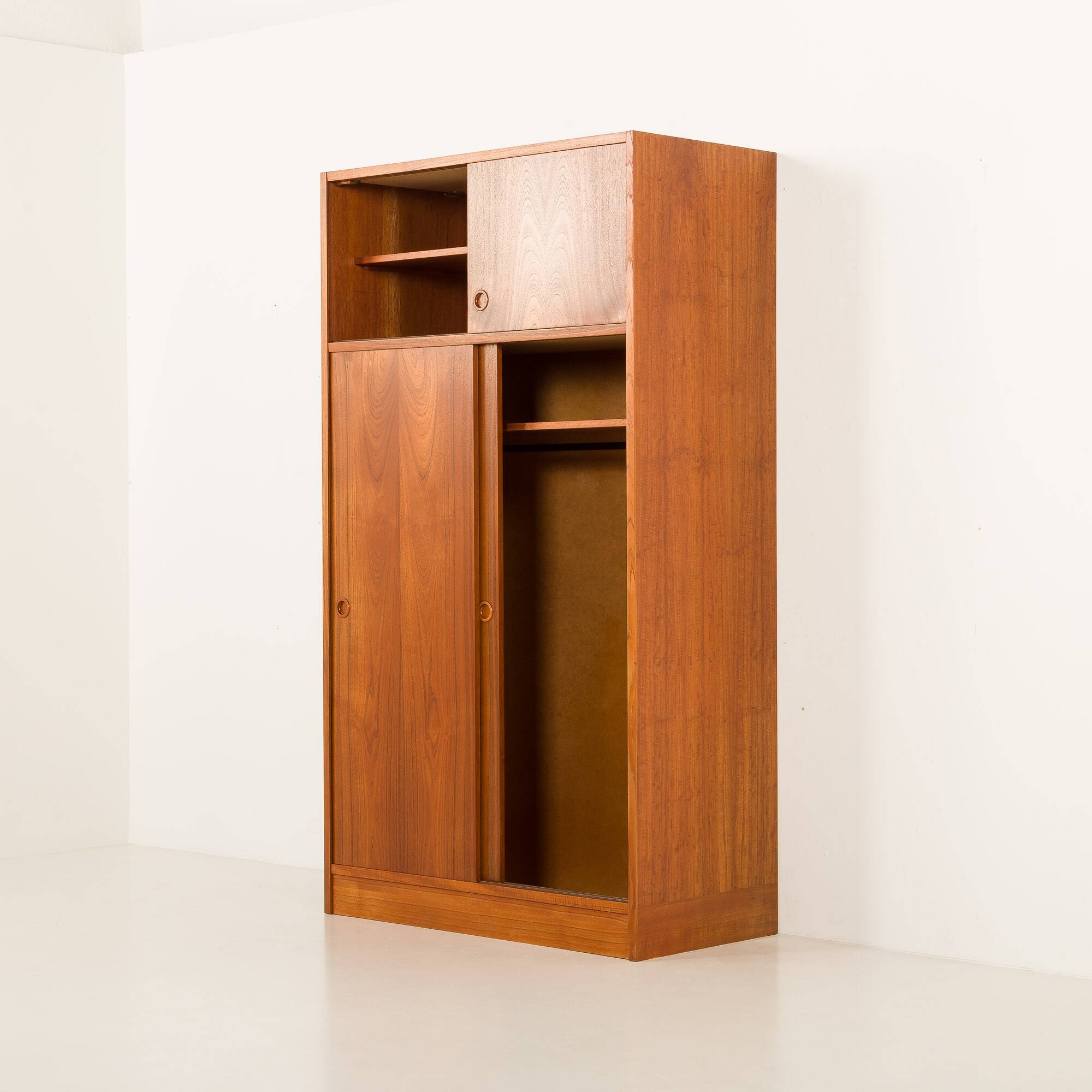 Danish teak wardrobe by Hundevad, 1960s
