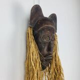 African ceramic and raffia mask signed BJ