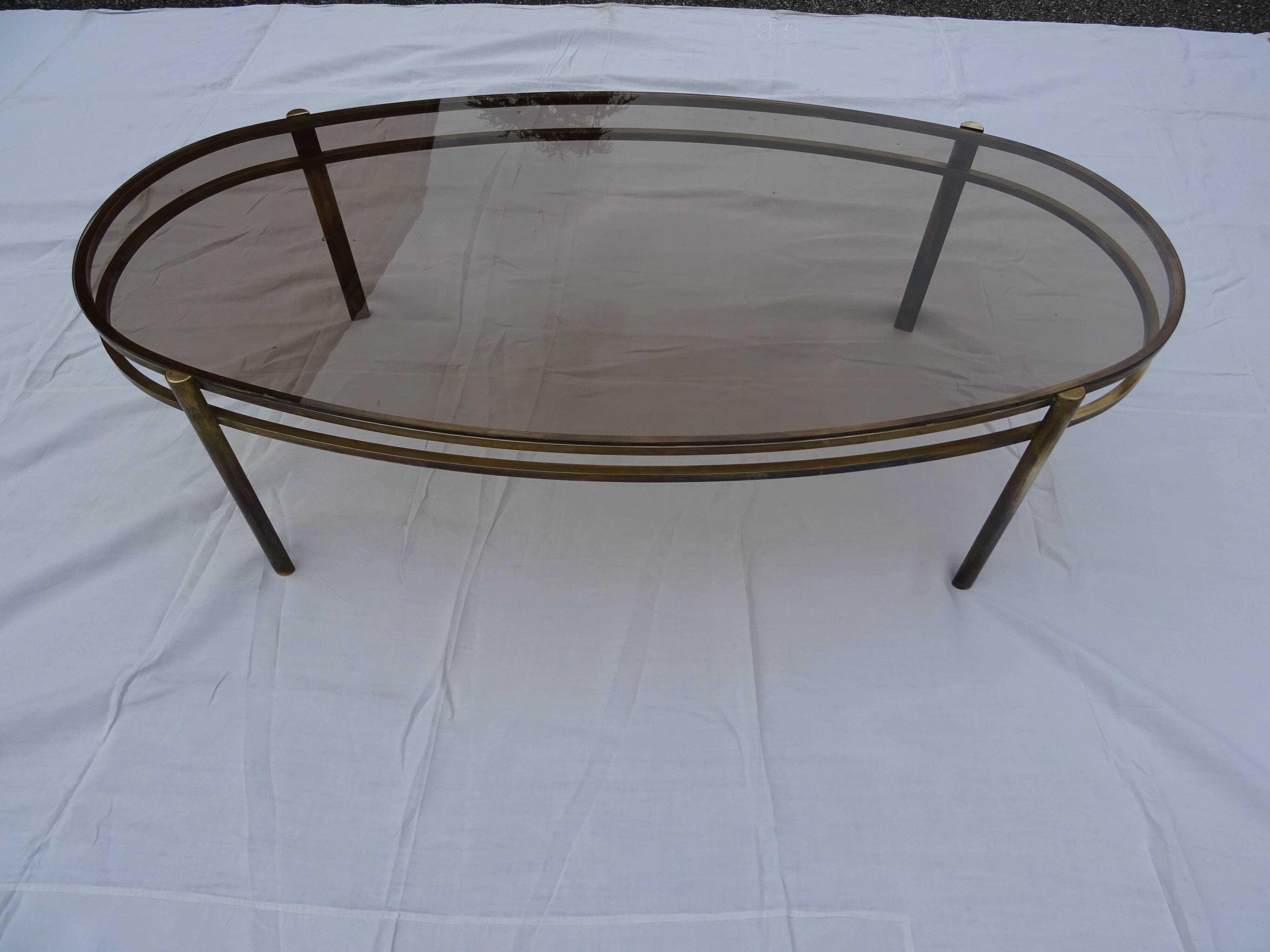 Coffee table low oval bronze doré Jacques Quinet 1950/1960