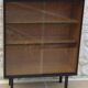 Storage unit, display cabinet with sliding glass doors, metal base