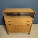 Storage furniture, vintage high sideboard in oak veneer.