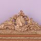 Napoleon III mirror with rich gilded ornamentation