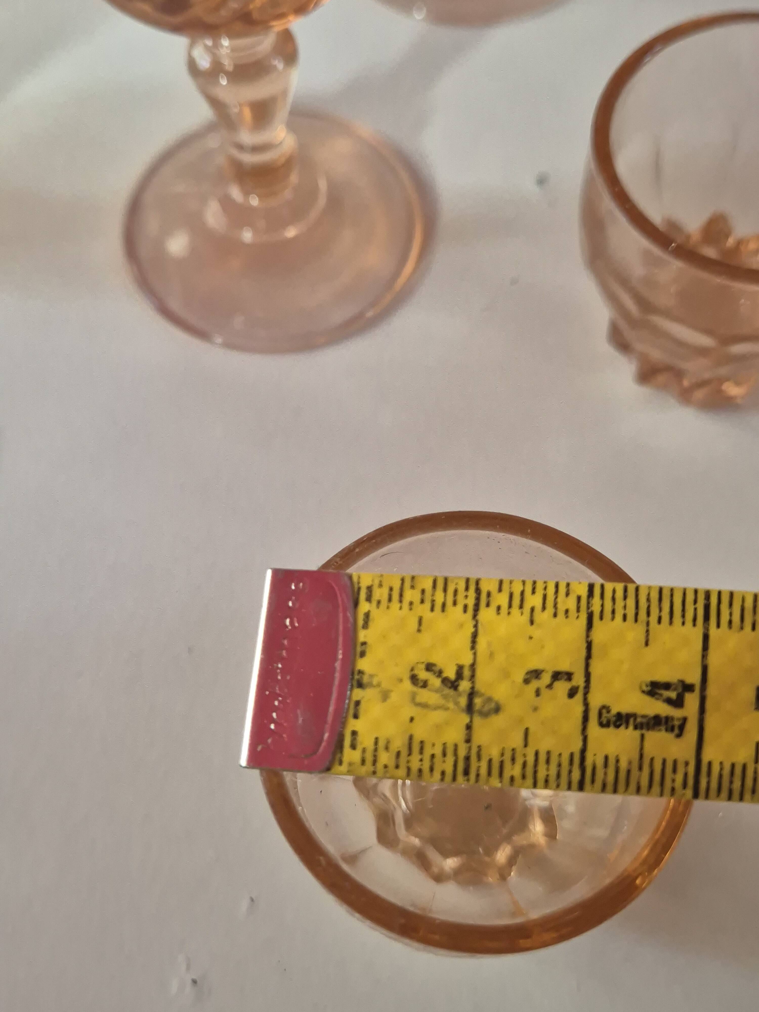 set of 12 stemmed glasses and 3 small vintage pink liqueur glasses in rosaline