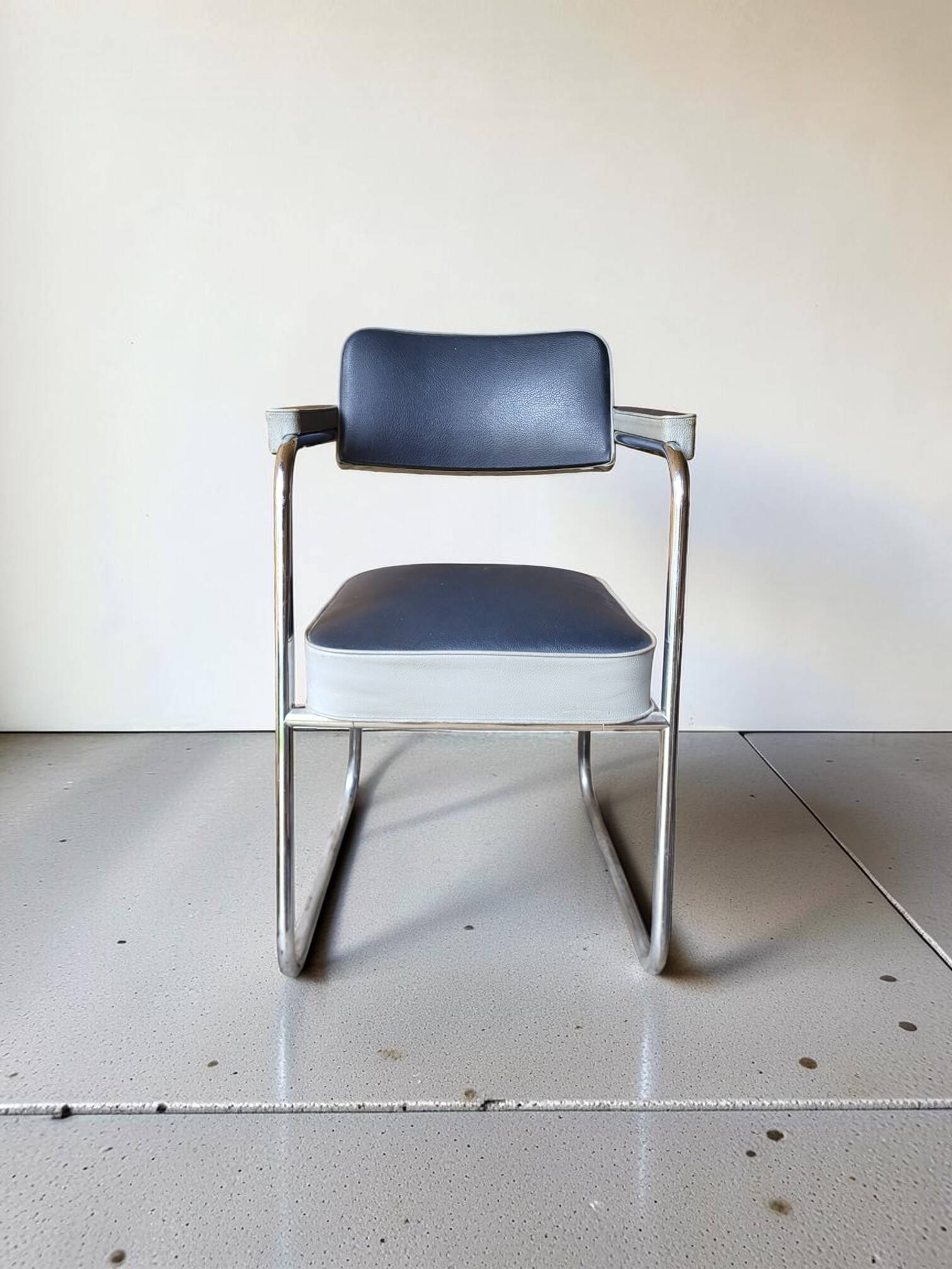 2 armchairs from the 1950s in the Ronéo style of Pullman.