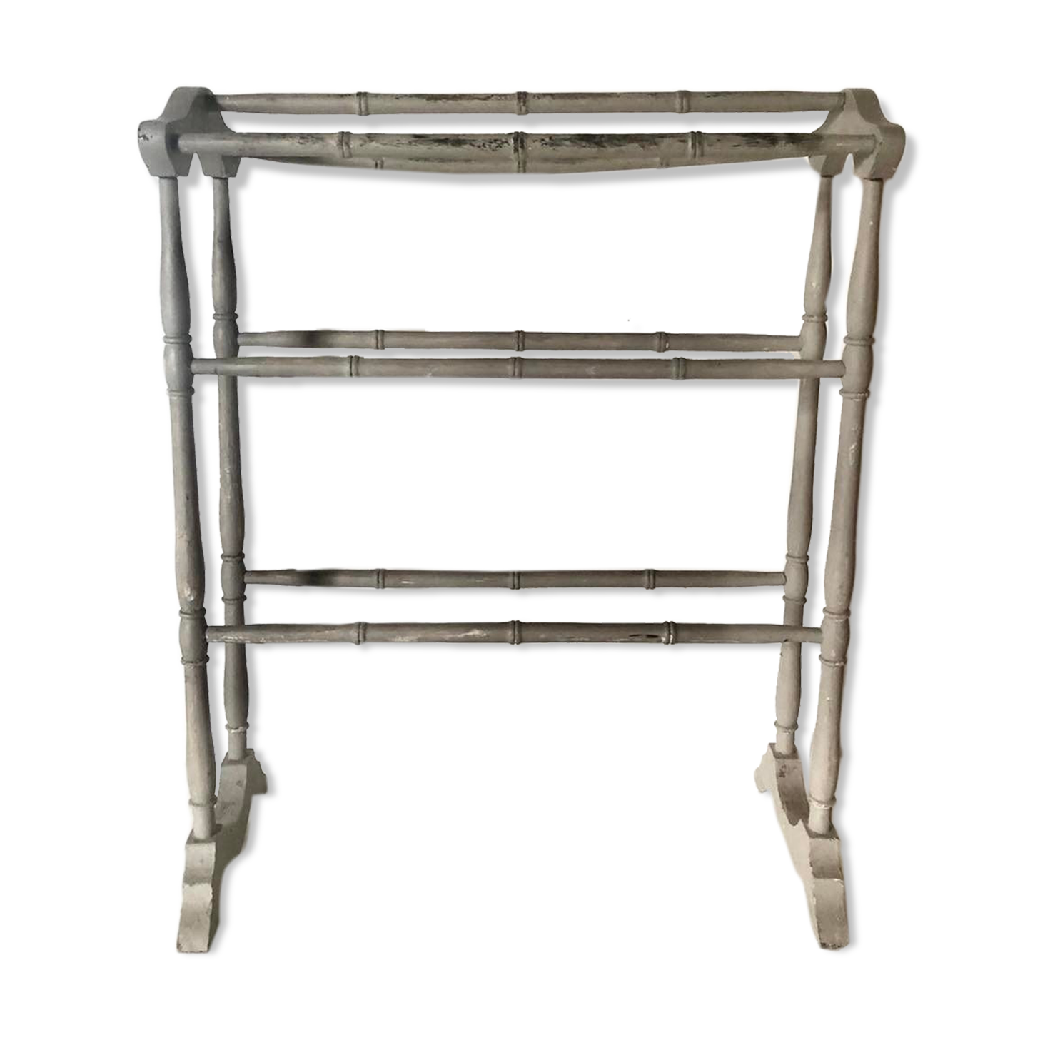 Old bathroom towel rack in patinated wood