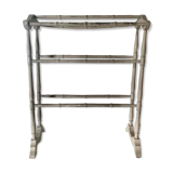 Old bathroom towel rack in patinated wood