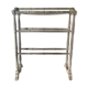 Old bathroom towel rack in patinated wood