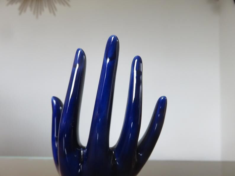Signed blue ceramic soliflore hand