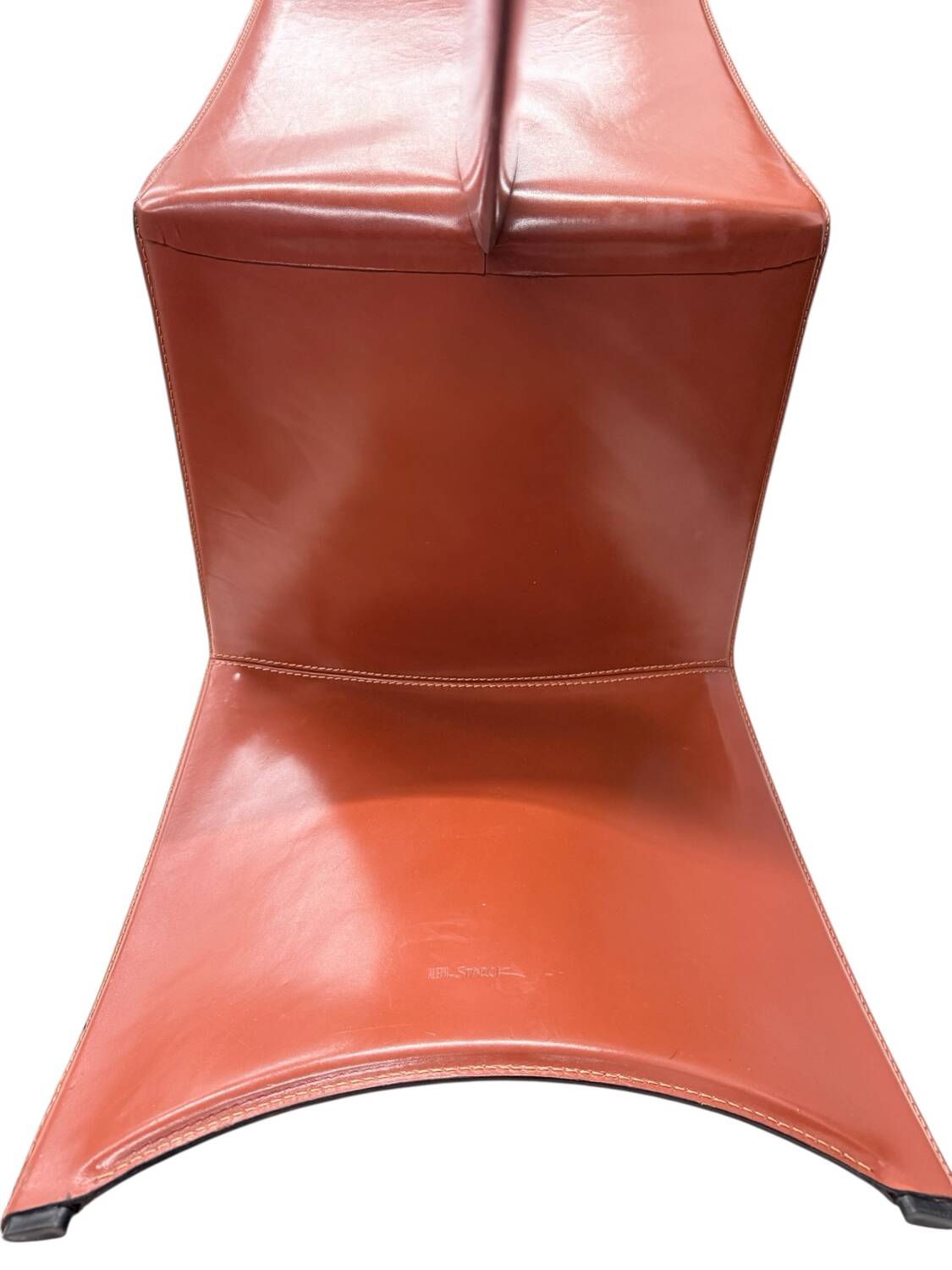 Red leather armchair in modern Italian style, signed Philippe Starck, 1980s.