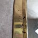 Vintage Moroccan wall mirror in brass, arch shape.