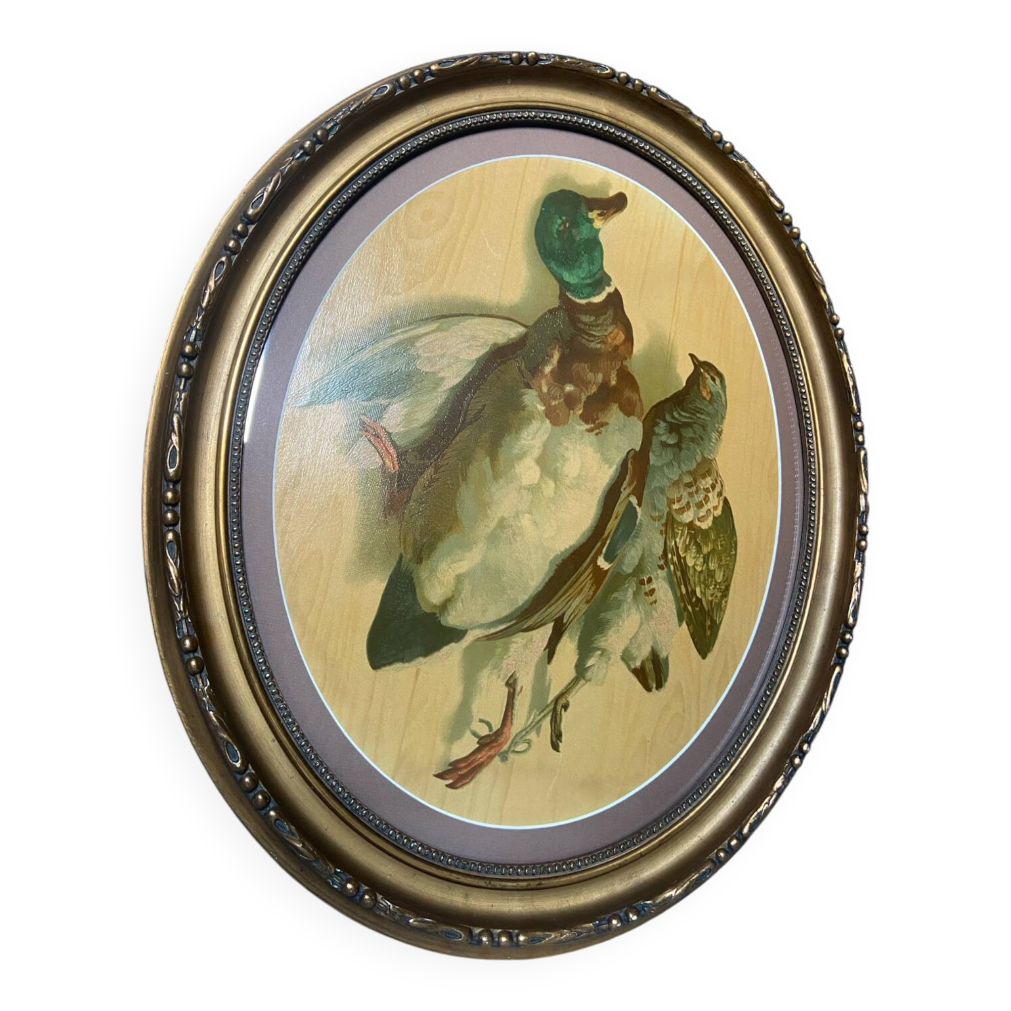 Antique oval frame with an oil painting of green collars